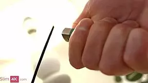 Redhead Aliska Dark gets analyzed with small breasts and shaved pussy.