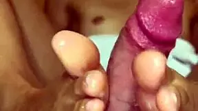 Latina Teen Gets Cum On Tiny Feet After Footjob.