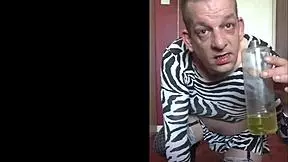 bisexual crossdresser mark wright asking for a man to fill his mouth up with piss while his mate films it on his mobile phone or camcorder