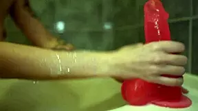 Sexy bitch passionately masturbates huge rubber cock wet vagina in bathroom