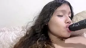 Teen girl fantasizes about huge cock while pleasuring herself