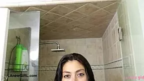 captivating brunette beauty took a shower