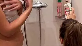 Lesbian shower turns sloppy double blowjob?
