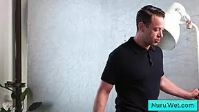 Teen masseuse slides naked body on client