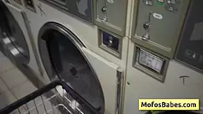 horny teen brunette sucks cock in public laundry