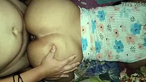 quietly enjoying a meal with a latina friend at home while visitors are over