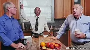 old man assists young girl in the shower