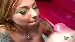 tattooed babe scarlett pain gives her lover a nice handjob.