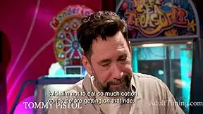 Teenage stepdaughter plays games with daddy in the arcade