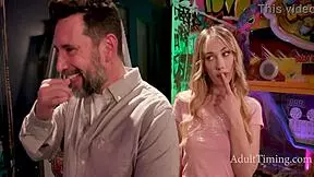 Teenage stepdaughter plays games with daddy in the arcade