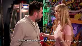 Teenage stepdaughter plays games with daddy in the arcade