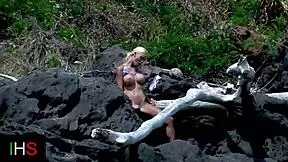 Amazing girl fucks black man on beach while another watches