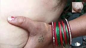 Husband and wife enjoy outdoor activities in village