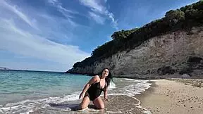 This horny curvy stepmom flashes her big tits on the public beach.