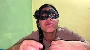 A submissive latina performs a deep blowjob