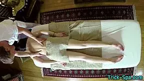 this sexy brunette babe gets a sensual massage from an old guy on hidden cam