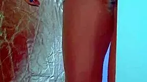watch this college desi in sexy dress playing with glass dildo!