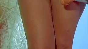 watch this college desi in sexy dress playing with glass dildo!