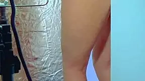 watch this college desi in sexy dress playing with glass dildo!