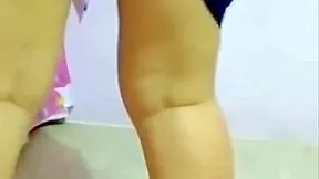 Young woman earns money through intimate acts with an older man in a homemade setting