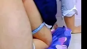 Young woman earns money through intimate acts with an older man in a homemade setting