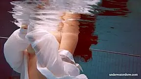 i'm watching lola's big natural tits while she swims underwater