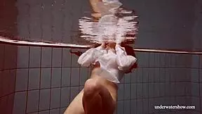 i'm watching lola's big natural tits while she swims underwater