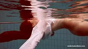 i'm watching lola's big natural tits while she swims underwater