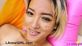 This gorgeous Asian model strips down for a close-up view.