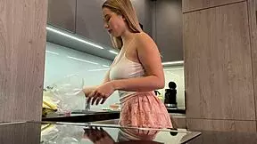 big boobs blonde hot college girl in a mini skirt do house chores and flashes her legs and ass under her miniskirt