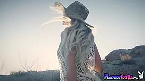 As the sun sets, petite blonde hottie Emma Hix poses nude outdoors.