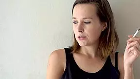 Hot Brunette Smoking Tease in Voyeur Scene