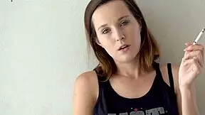 Hot Brunette Smoking Tease in Voyeur Scene