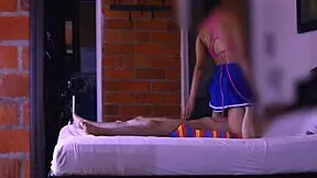 Stepmom and student share mischievous smile in hallway glance