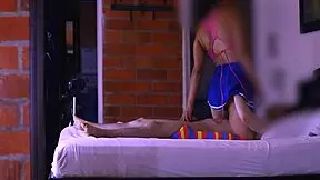 Stepmom and student share mischievous smile in hallway glance