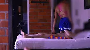 Stepmom and student share mischievous smile in hallway glance