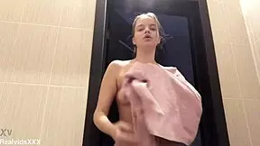hey watch this young euro babe soap up her small tits and shaved pussy while masturbating in the shower