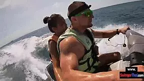 Asian girlfriend sucks cock hard on public jetski