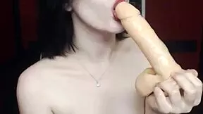 gothic teen in lingerie smokes while deepthroating dildo messily