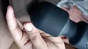 she's this horny desi babe on her bed givin a footjob while buzzin her vibrator till she moans loud