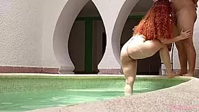 Redhead housewife spreads gaping asshole for public pool anal fisting trouble