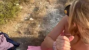 What if blonde babe gives deepthroat blowjob high in mountains then takes facial cumshot outdoors?