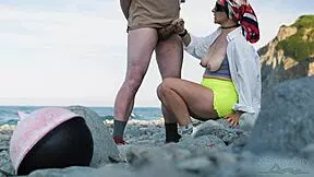 She spots beach stranger and strokes his monster cock publicly