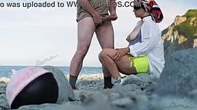 She spots beach stranger and strokes his monster cock publicly