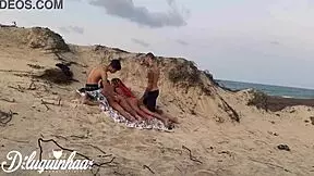 lost on beach wanna strip for hot menage?