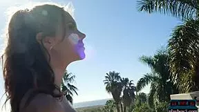 elina love stripteases her petite shaved pussy outdoors