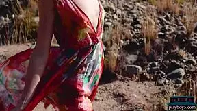 elina love stripteases her petite shaved pussy outdoors