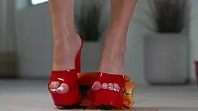 hey check out this petite brunette crushing fruits under high heels... yum for foot fetish fans 👠🍇💥