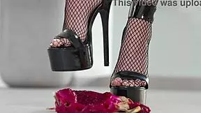 hey check out this petite brunette crushing fruits under high heels... yum for foot fetish fans 👠🍇💥