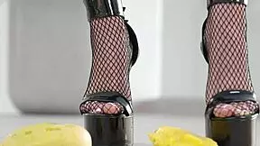 hey check out this petite brunette crushing fruits under high heels... yum for foot fetish fans 👠🍇💥